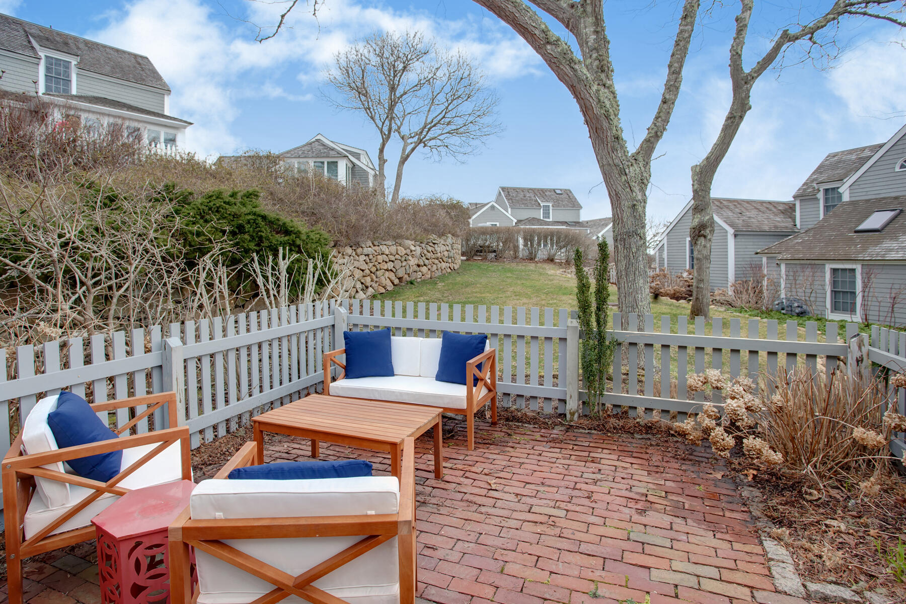 7 Flying Cloud Circle Mashpee, MA 02649 - Photo 17 of 23 a view of a patio with iron fence