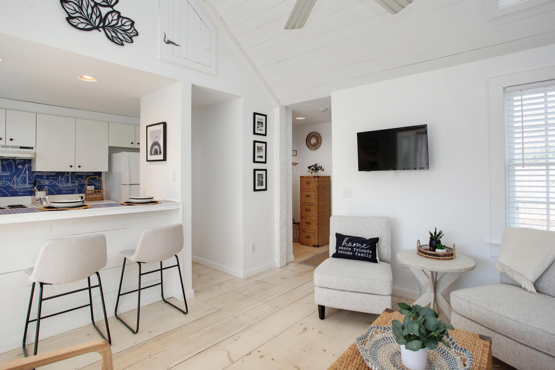 7 Flying Cloud Circle Mashpee, MA 02649 - Photo 2 of 23 a living room with furniture and a flat screen tv