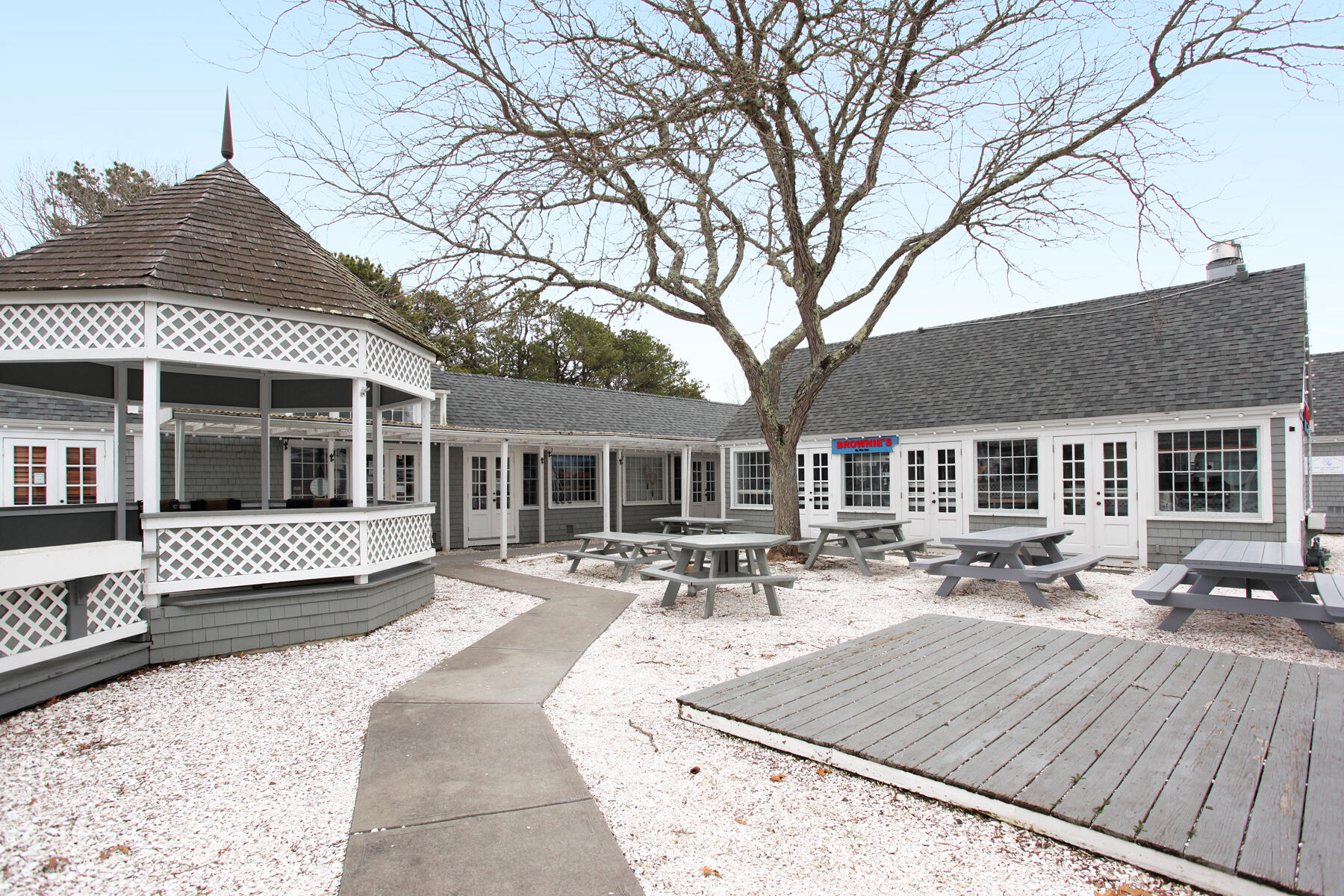 7 Flying Cloud Circle Mashpee, MA 02649 - Photo 23 of 23 a front view of house with outdoor seating and covered with trees