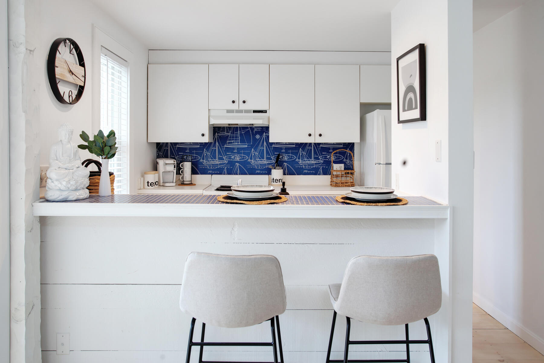 7 Flying Cloud Circle Mashpee, MA 02649 - Photo 7 of 23 a kitchen with stainless steel appliances granite countertop a table and chairs in it