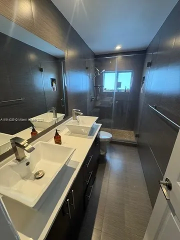 a room with gym equipment equipment and a window