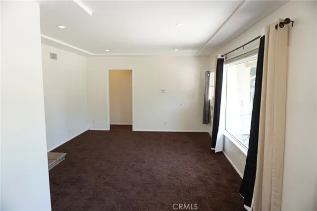 a kitchen with stainless steel appliances a stove and a refrigerator