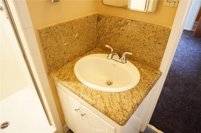 a bathroom with a sink and a toilet