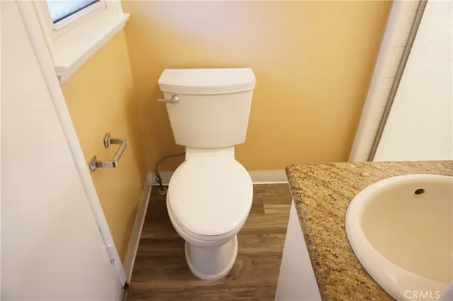 a floor to ceiling window and a rug