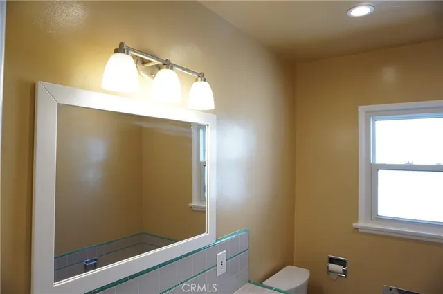 a view of a backyard with chairs