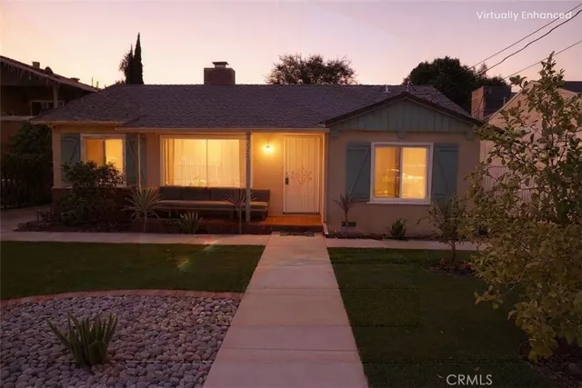 a house view with a garden space