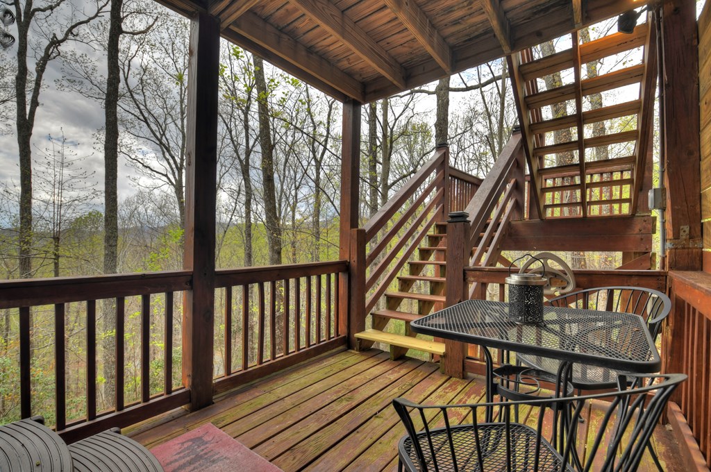 203 Chimney Rock Court Blue Ridge, GA 30513 - Photo 38 of 52 a view of balcony with furniture and wooden floor