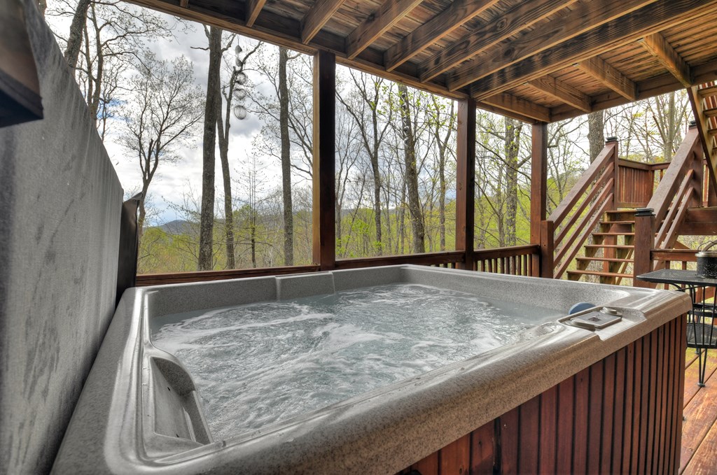 203 Chimney Rock Court Blue Ridge, GA 30513 - Photo 41 of 52 Lower deck with hot tub