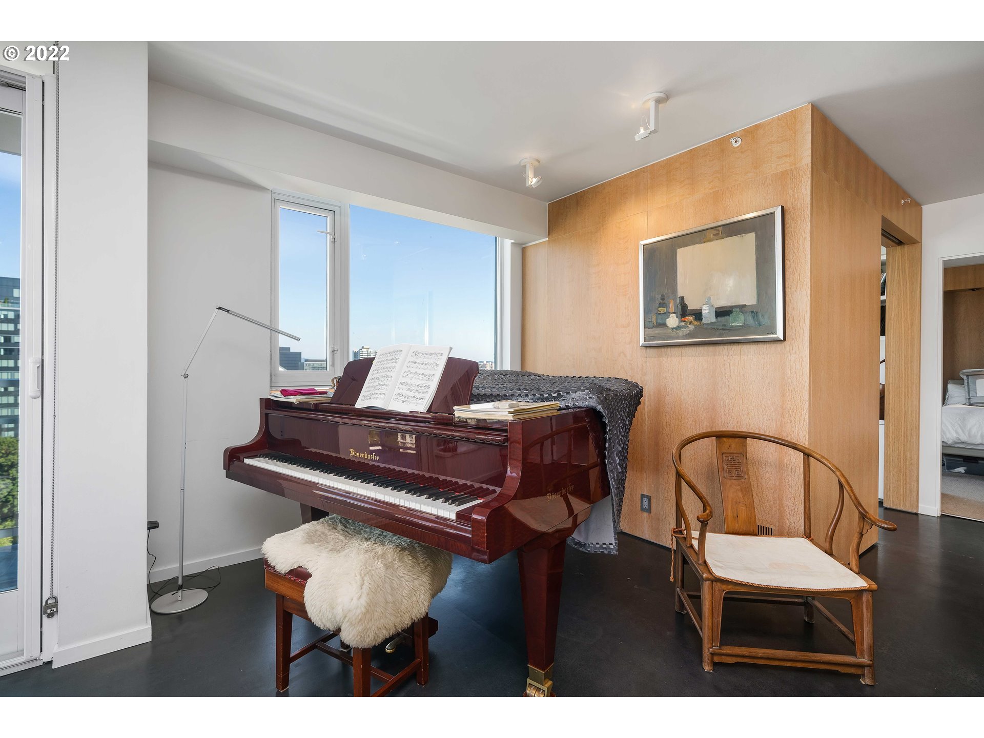 1500 Southwest 11th Avenue, Unit 1504 Portland, OR 97201 - Photo 11 of 32 a living room with furniture and a piano