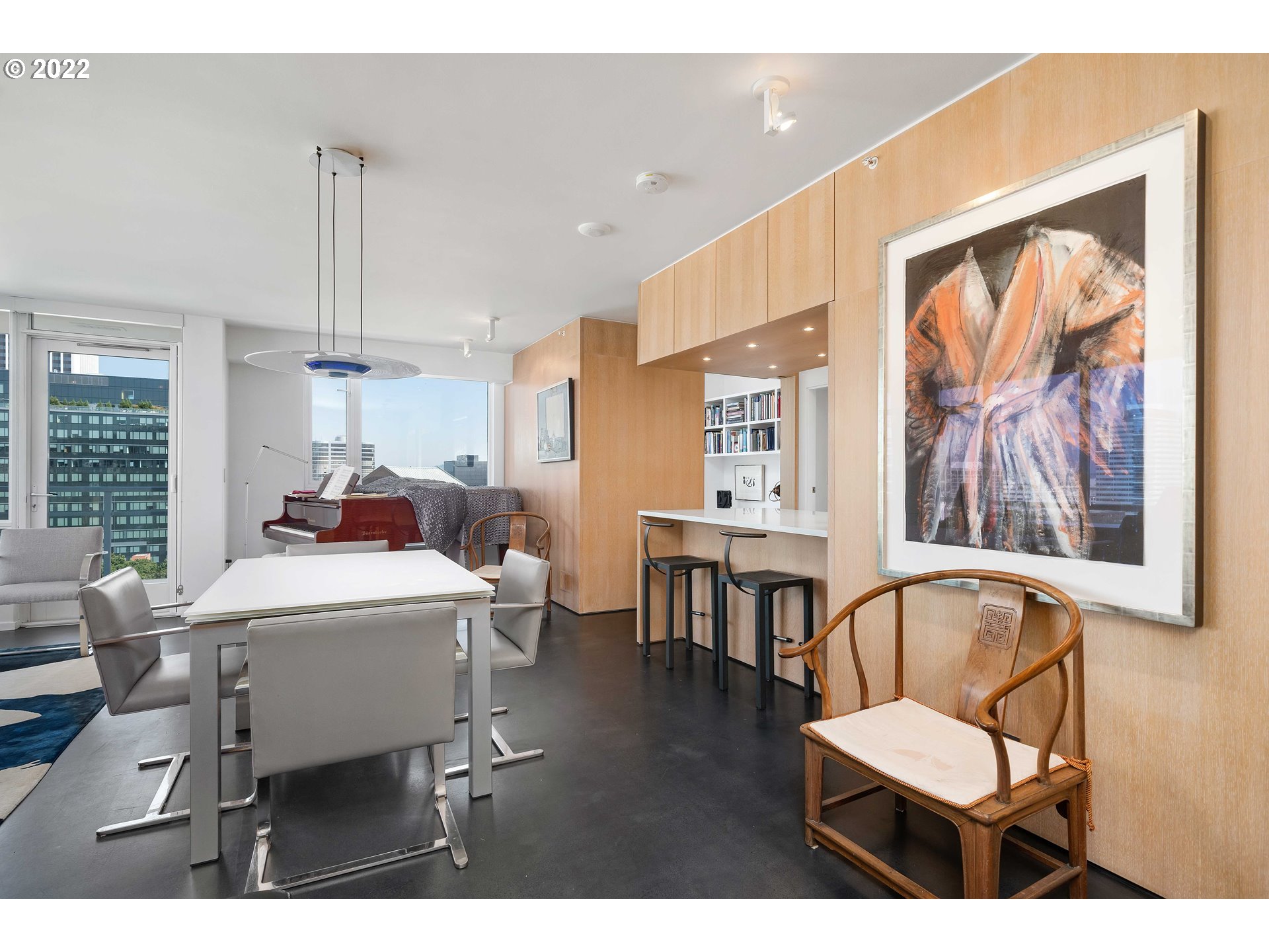 1500 Southwest 11th Avenue, Unit 1504 Portland, OR 97201 - Photo 10 of 32 a living room with furniture two window and a painting