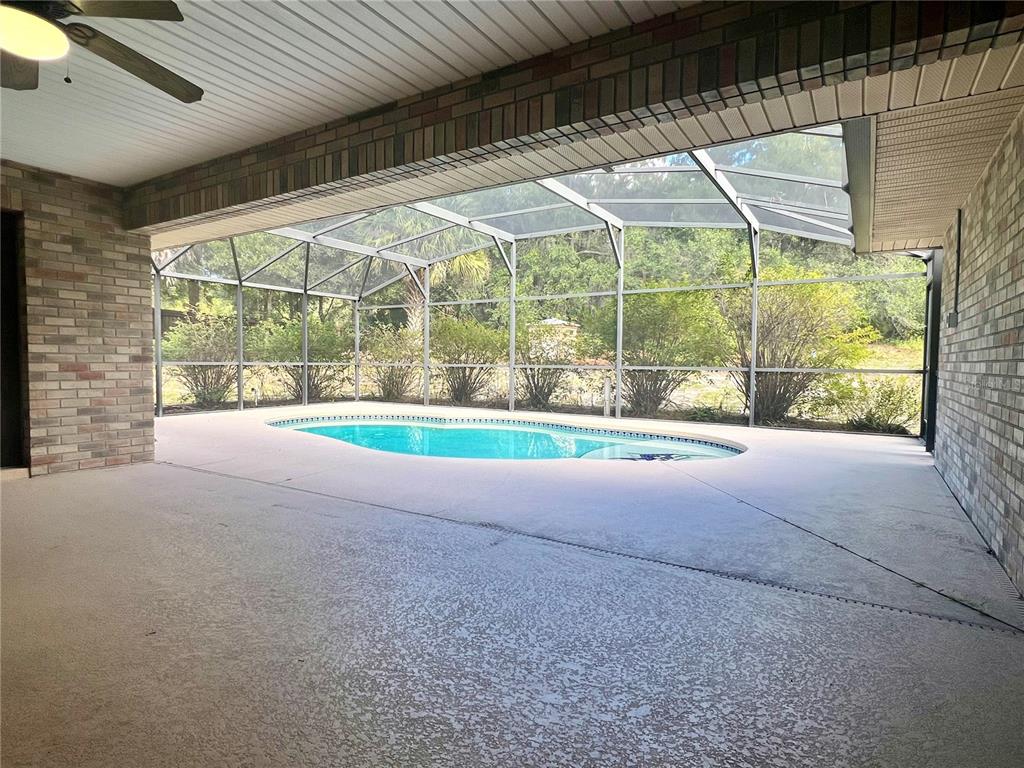 1156 South Carpenter Avenue Orange City, FL 32763 - Photo 2 of 21 a living room with a large window