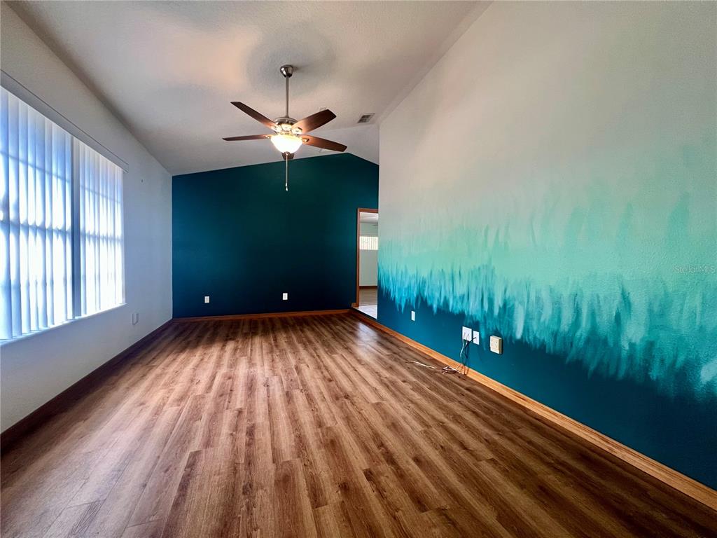 1156 South Carpenter Avenue Orange City, FL 32763 - Photo 10 of 21 a view of a room with a big yard