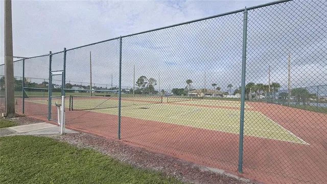 a view of a house with a big yard