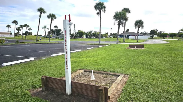a view of a park with houses