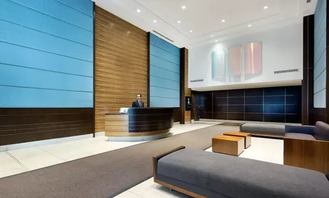 a view of kitchen with granite countertop sink