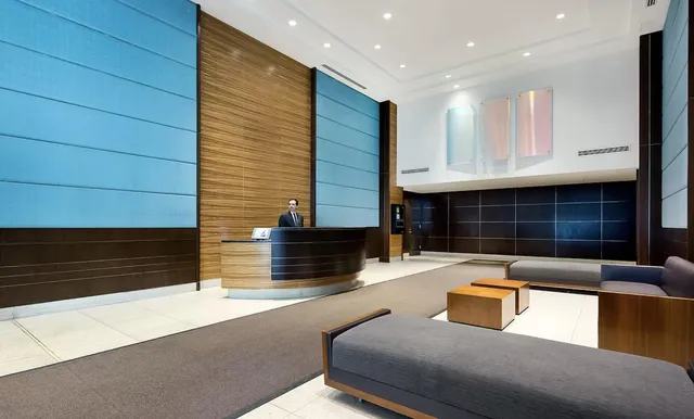 a view of kitchen with granite countertop sink