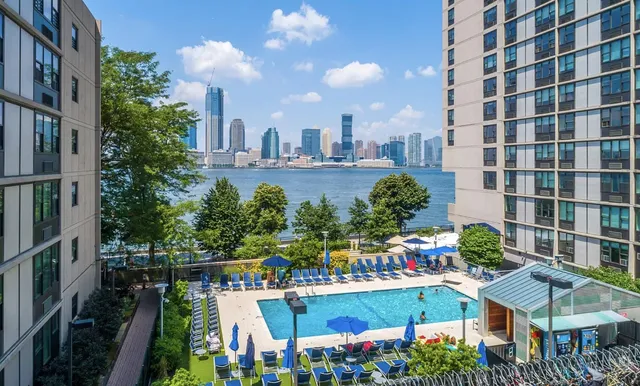 a view of a city with tall buildings