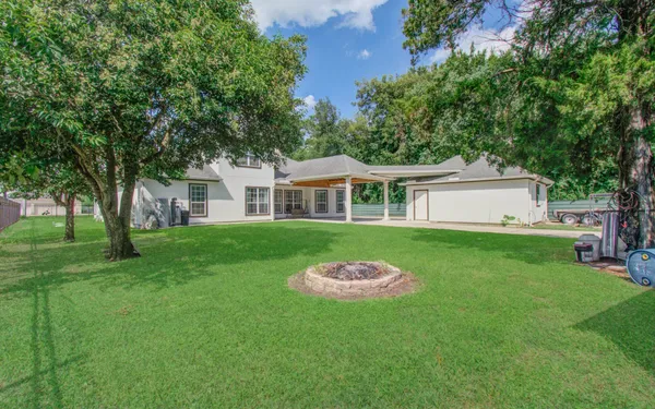 a view of gallery with wooden floor