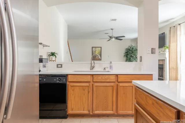 a spacious bathroom with a sink and a mirror