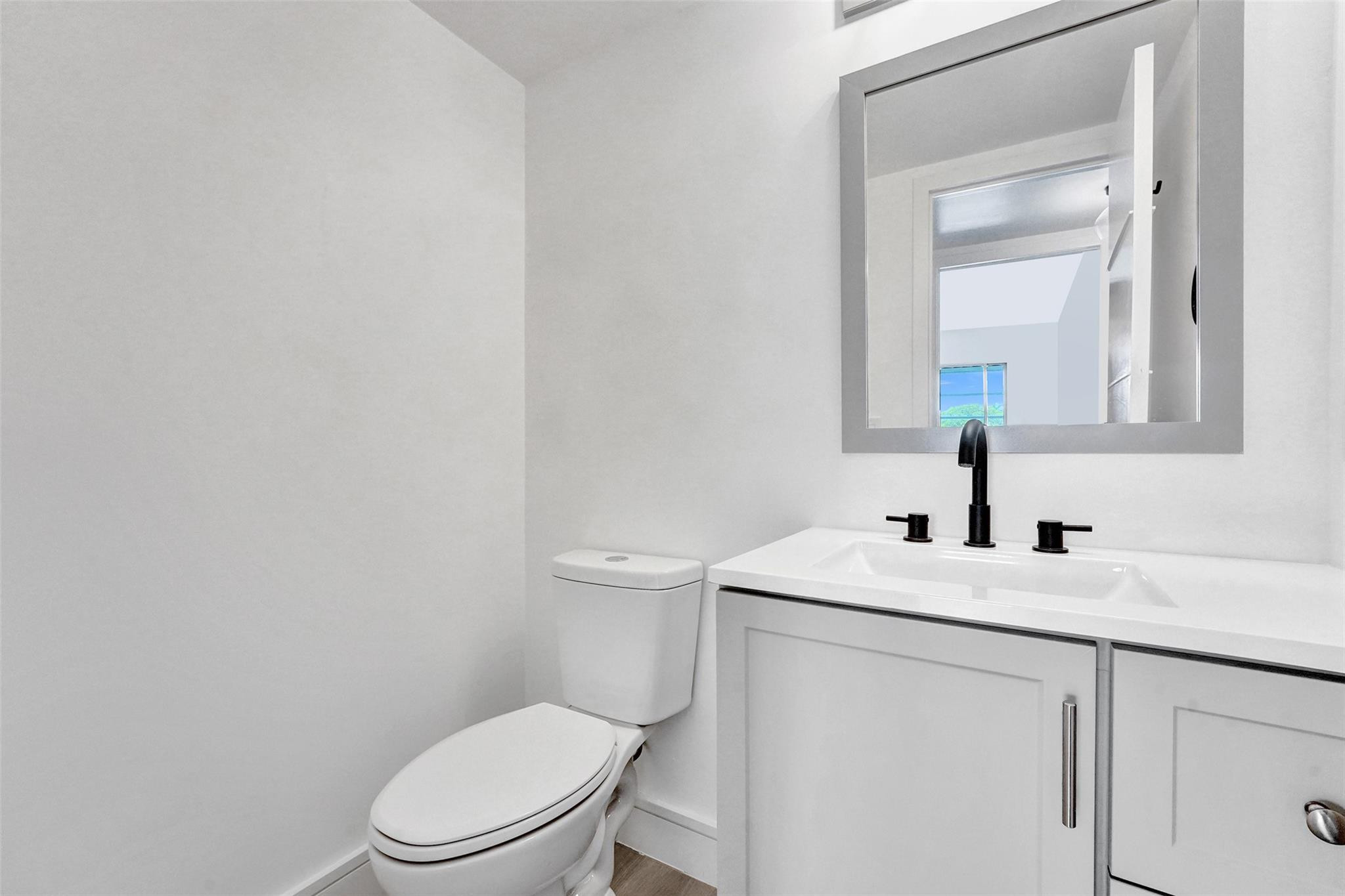 3002 Guildford East, Unit 3002 Boca Raton, FL 33434 - Photo 14 of 20 Half Bathroom