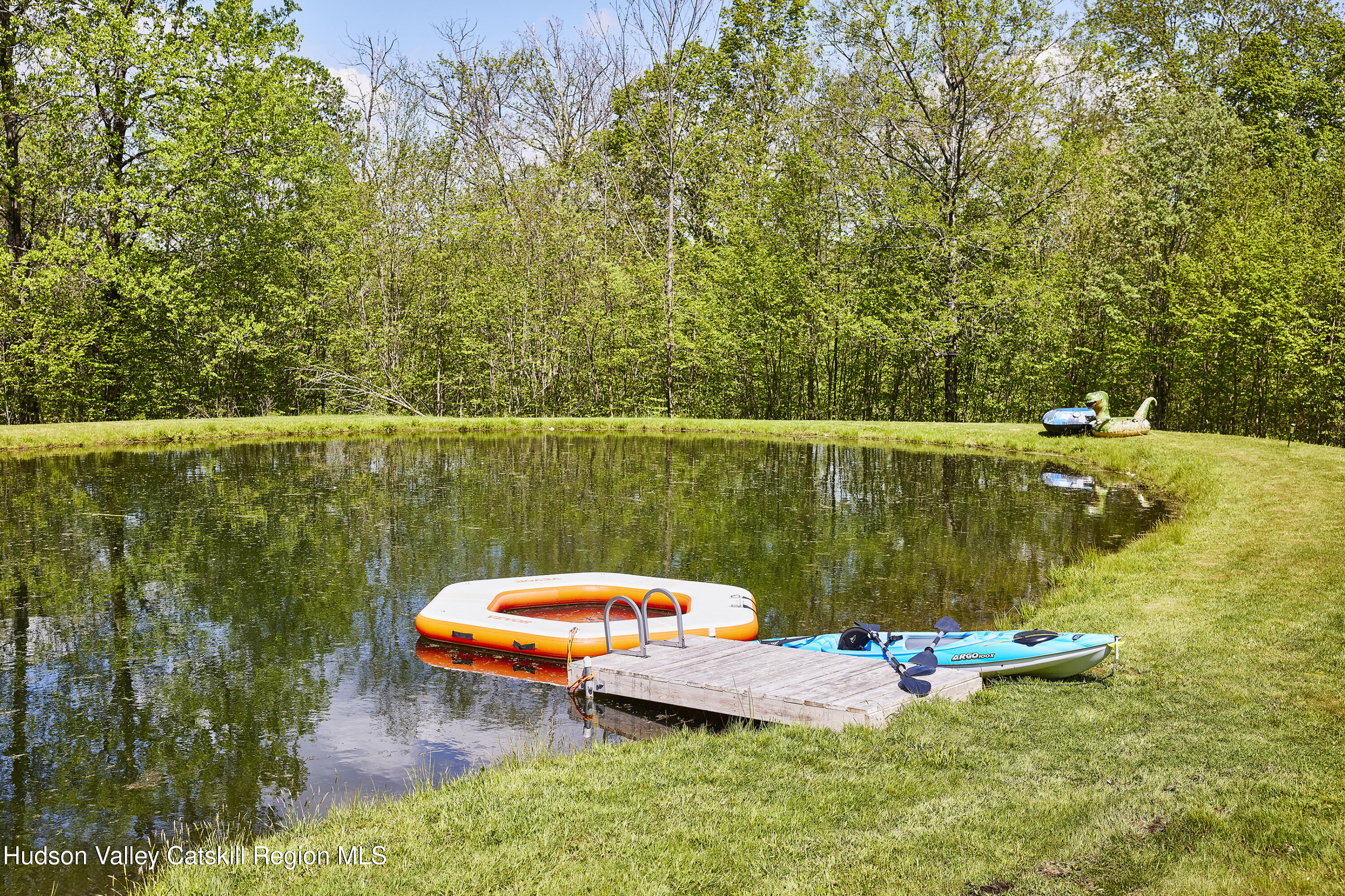 55 Hunter Road Parksville, NY 12768 - Photo 28 of 35 a view of a swimming pool with a lounge chair
