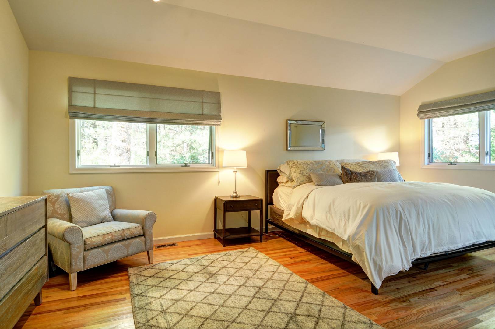 120 Springy Banks Road East Hampton, NY 11937 - Photo 6 of 10 a bedroom with a bed and wooden floor