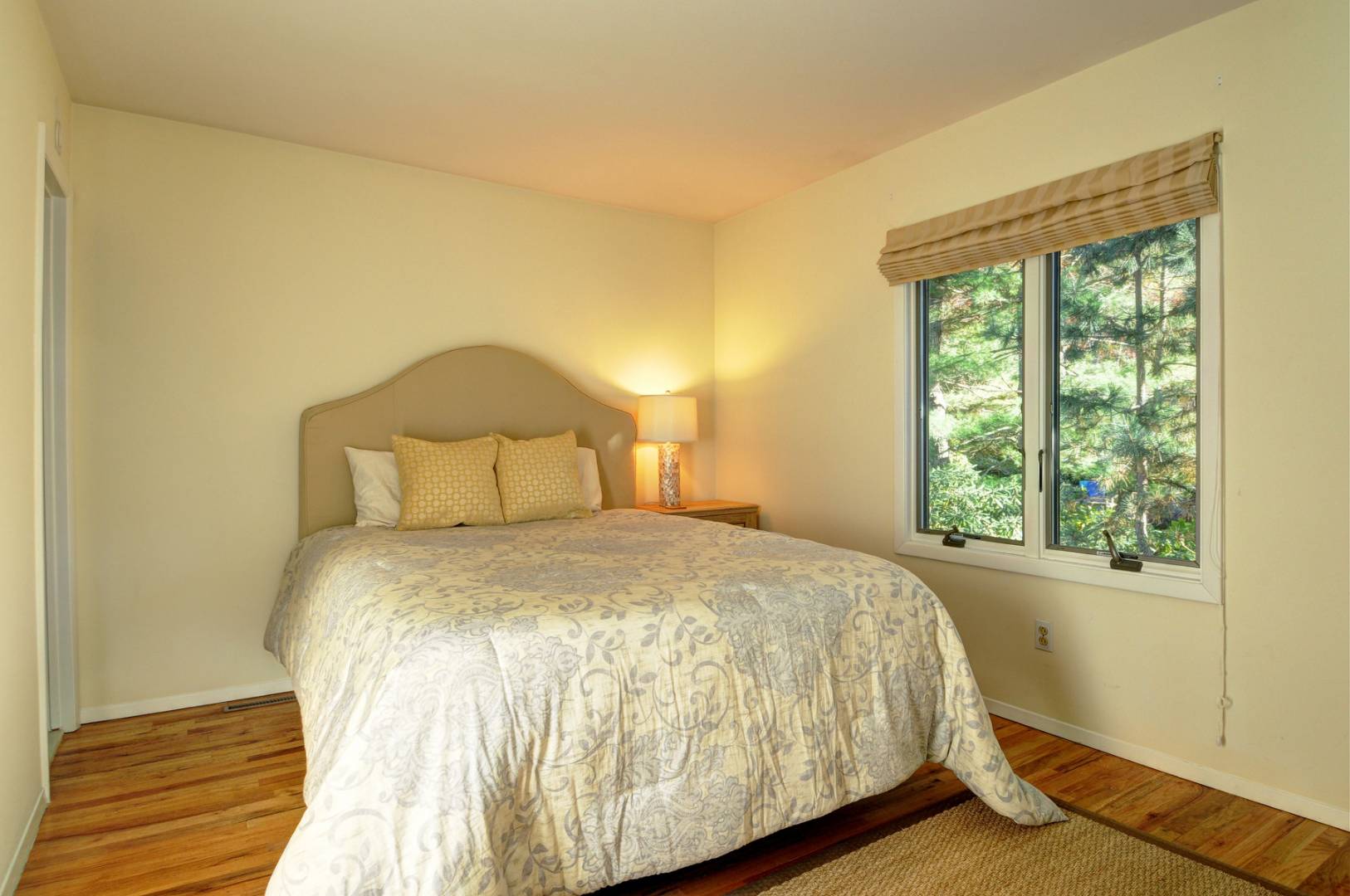 120 Springy Banks Road East Hampton, NY 11937 - Photo 7 of 10 a bedroom with a bed and a window