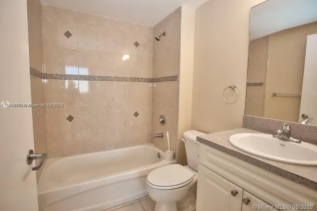 a bathroom with a sink a toilet and a bathtub