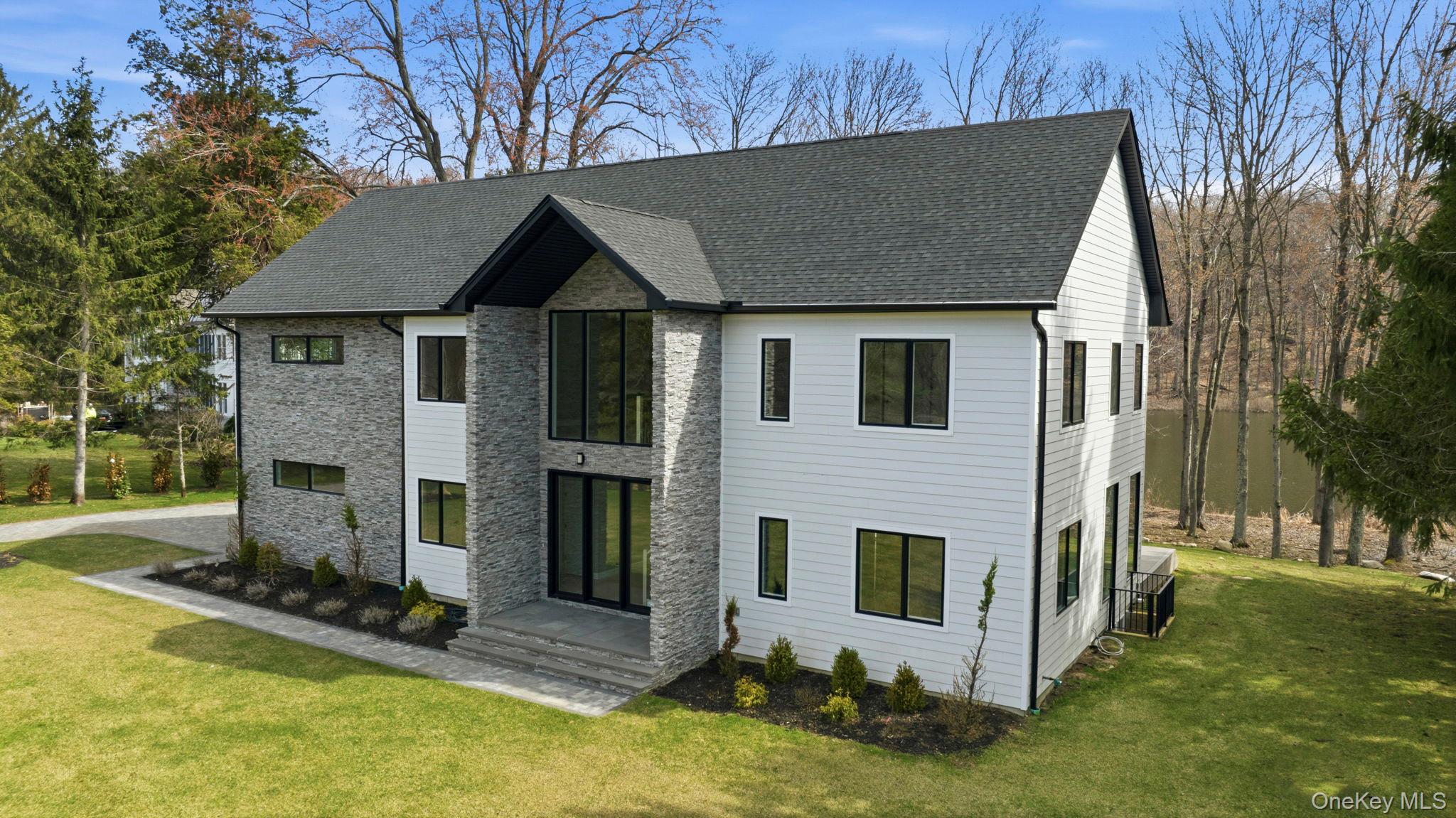 a front view of house with yard