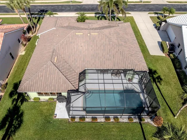 a living room with furniture a clock and a rug