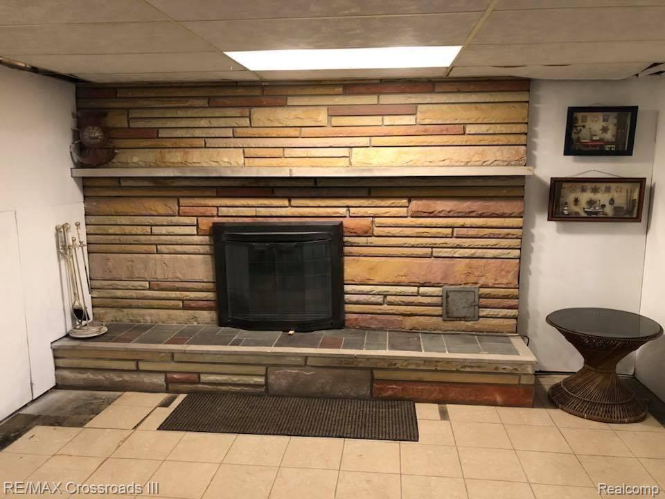 15487 Haggerty Road Belleville, MI 48111 - Photo 49 of 82 Lower Fireplace