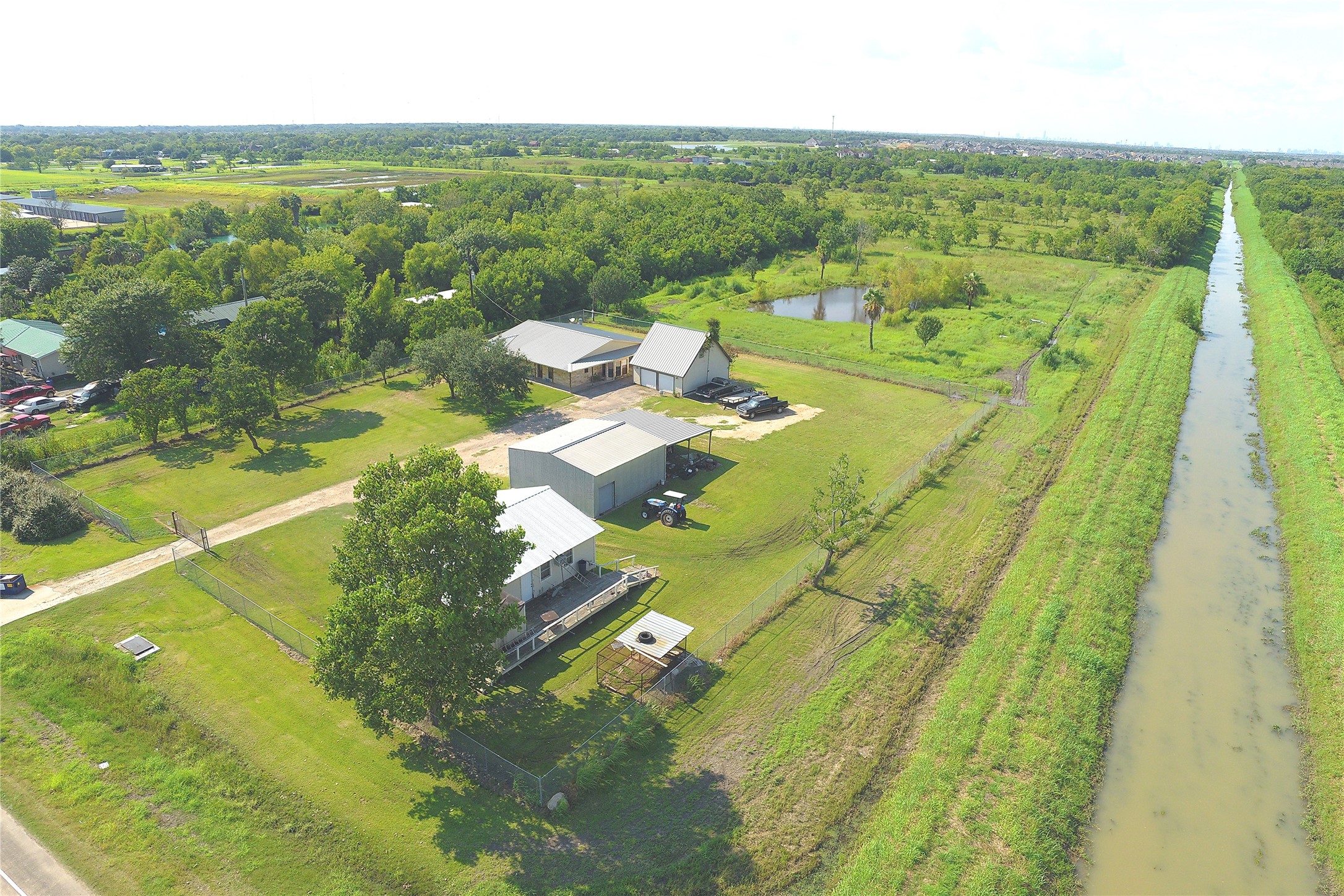 2883 County Road 58 Manvel, TX 77578 - Photo 13 of 24 5.97 Ac on Heavily Travelled CR-58 (Croix RD), Buildings on property could serve as office space for your business