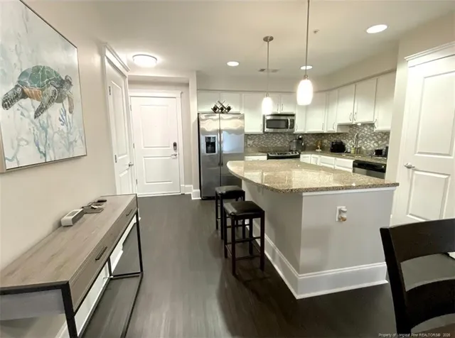 $430,000 | 222 Glenwood Avenue, Unit 208, Raleigh, NC 27603