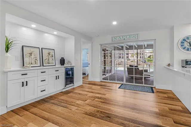 a room with natural light and wooden floor