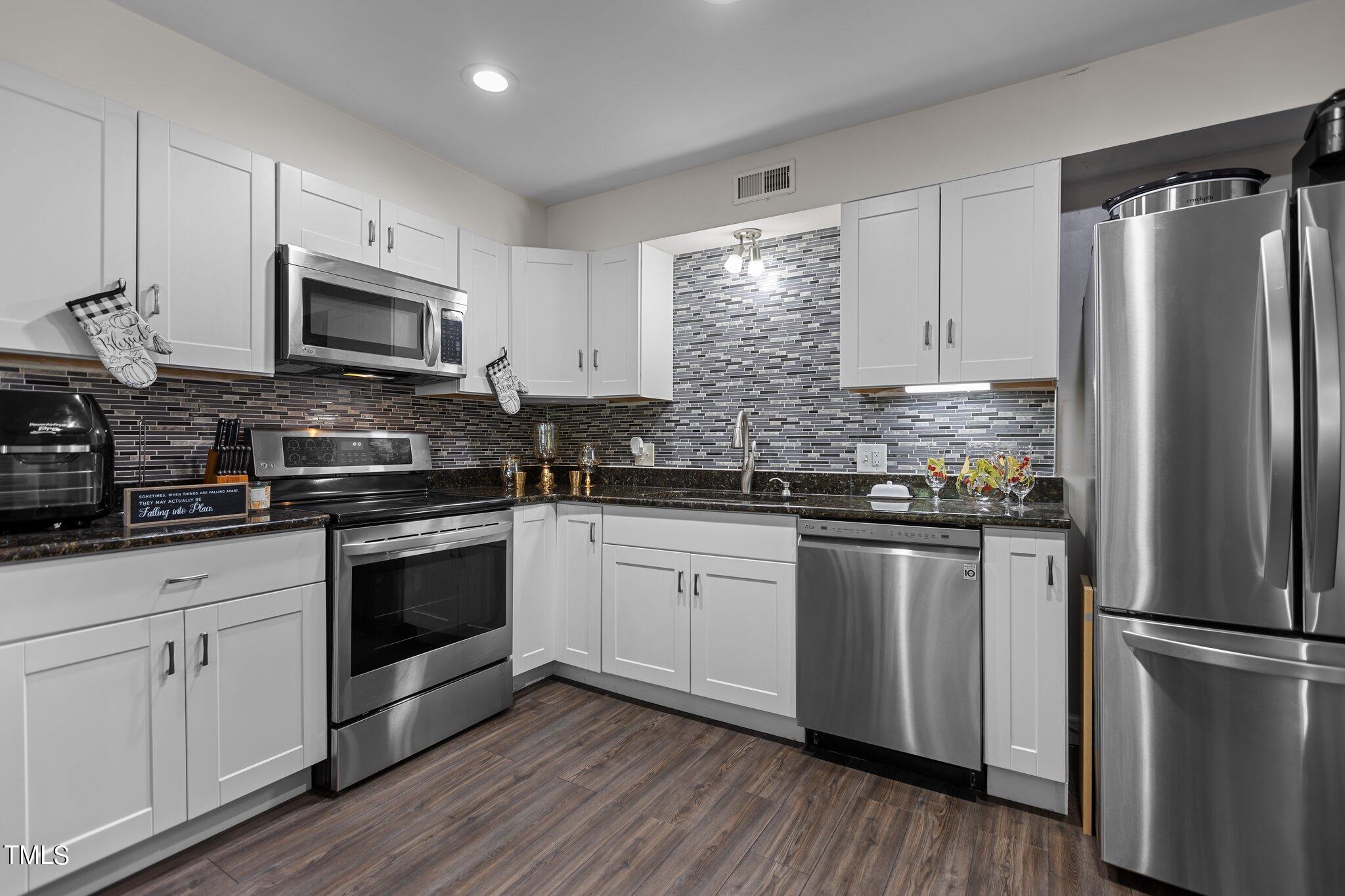 5022 Flint Ridge Place, Unit 5022 Raleigh, NC 27609 - Photo 1 of 35 1-web-or-mls-IMGL6784