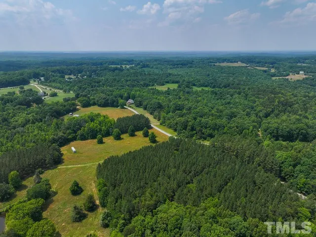 a view of a wooden floor in a bathroom