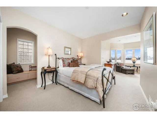 a bedroom with furniture and a couch