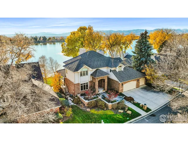 a aerial view of a house with a ocean view