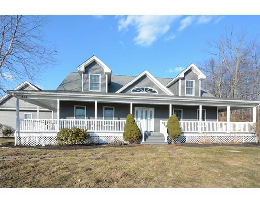 244 East County Road Rutland, MA 01543 - Photo 1 of 30 a front view of a house with garden