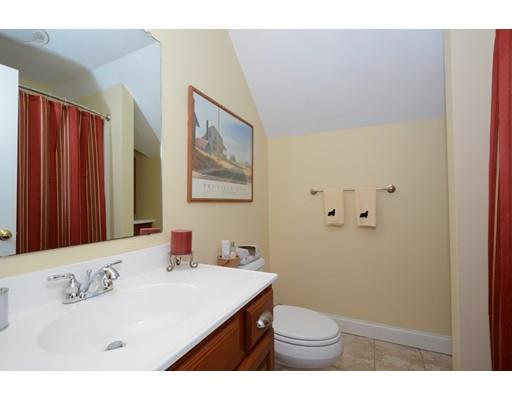 244 East County Road Rutland, MA 01543 - Photo 21 of 30 a bathroom with a sink a toilet and mirror
