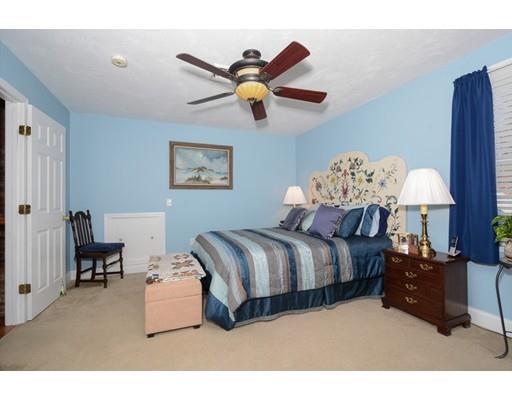 244 East County Road Rutland, MA 01543 - Photo 22 of 30 a living room with a bed furniture and a chandelier