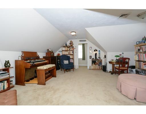 244 East County Road Rutland, MA 01543 - Photo 26 of 30 a living room with furniture and a bookshelf