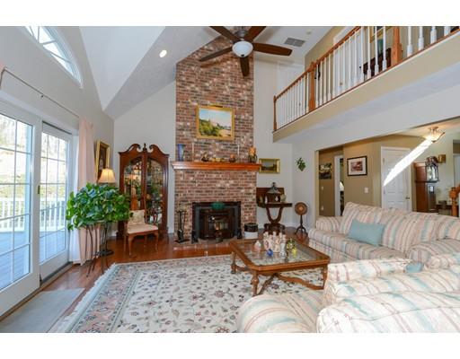 244 East County Road Rutland, MA 01543 - Photo 3 of 30 a living room with furniture and a fireplace