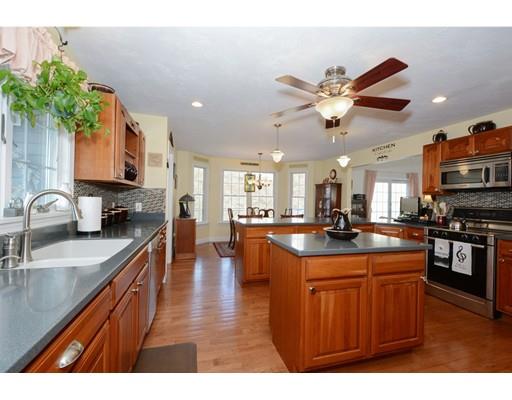 244 East County Road Rutland, MA 01543 - Photo 6 of 30 a kitchen with stainless steel appliances granite countertop a sink a stove top oven a counter space and cabinets