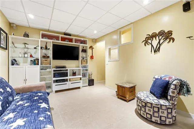 an aerial view of a house with a garden