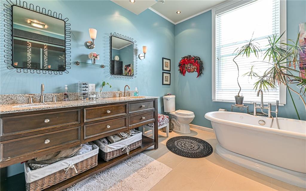 381 Friday Road Pittsburgh, PA 15209 - Photo 17 of 44 a bathroom with a double vanity sink mirror and bathtub