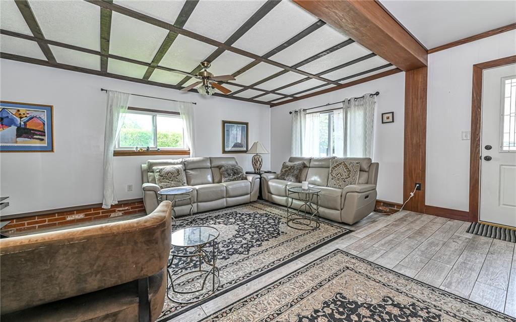381 Friday Road Pittsburgh, PA 15209 - Photo 30 of 44 a living room with furniture and a rug
