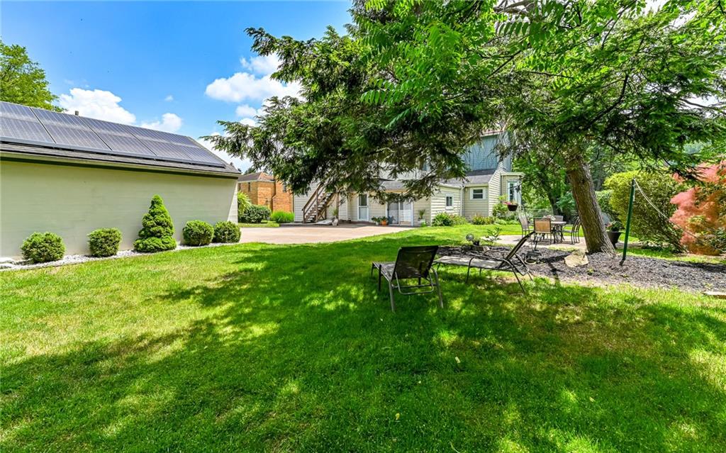 381 Friday Road Pittsburgh, PA 15209 - Photo 38 of 44 a view of backyard with a table and chairs