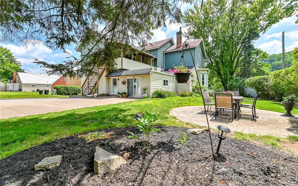 381 Friday Road Pittsburgh, PA 15209 - Photo 39 of 44 a house with garden in front of it