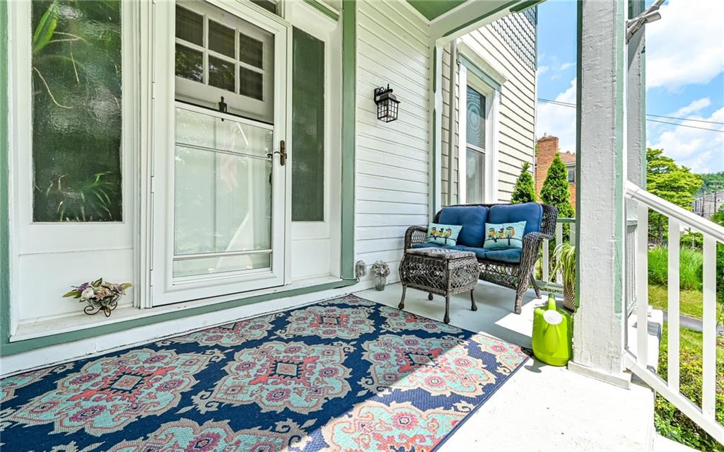 381 Friday Road Pittsburgh, PA 15209 - Photo 6 of 44 a backyard of a house with table and chairs